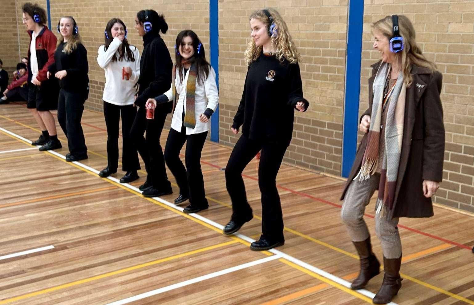 Ms Moutray-Read leading The Nutbush at the Silent Disco